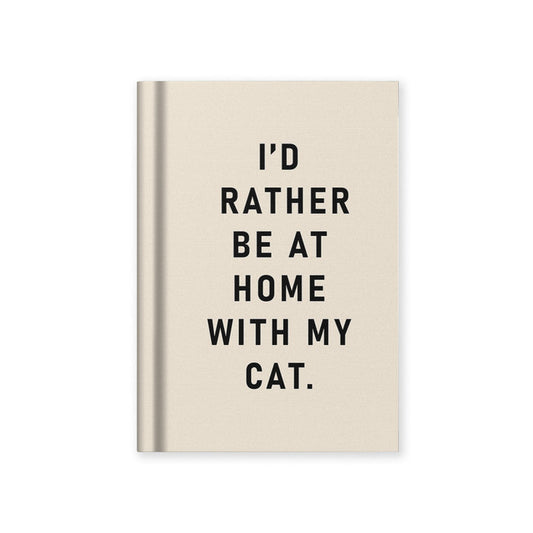 Beige hardback fabric notebook with black cat-themed quote text