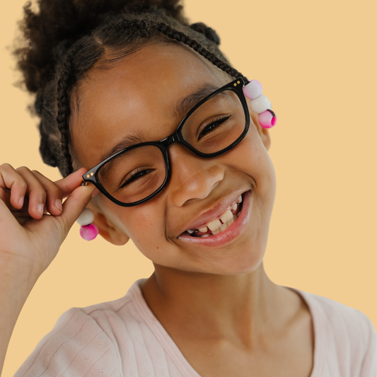Girl wearing Medium (48-16-135) / Black Cat Eye glasses [variants=40919064313941]  [size=Medium (48-16-135)] [color=black][child face]