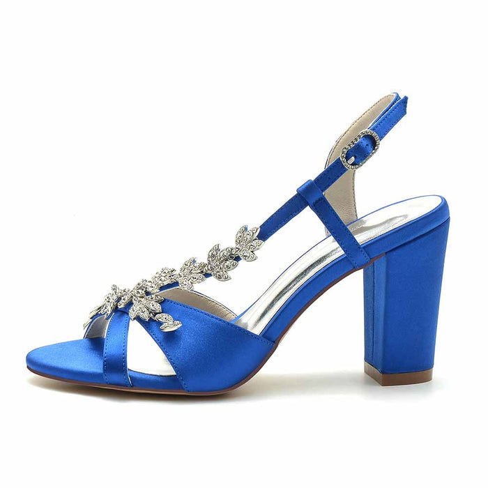 Beaded satin prom sandals in royal blue with a block heel and elegant floral embellishments