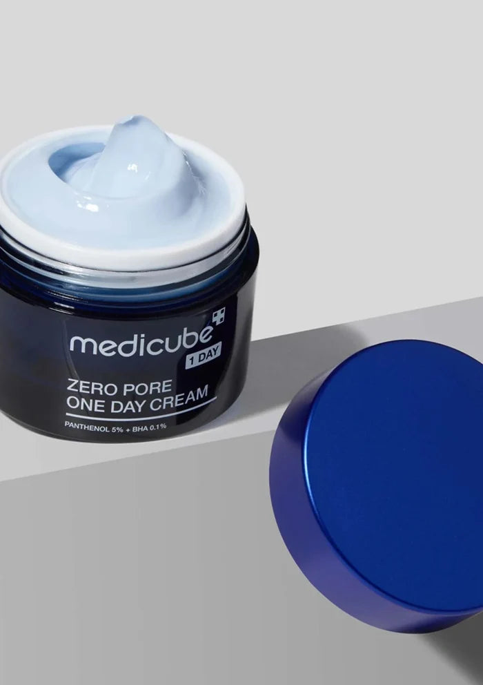 Jar of Medicube Zero Pore One Day Cream on a gray background