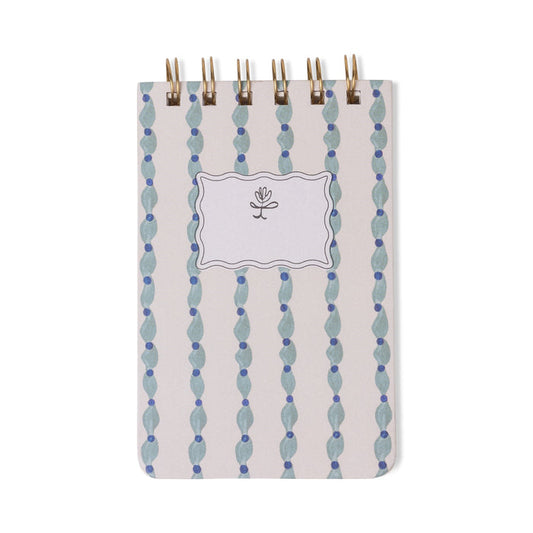 Twin wire notepad with wavy blue pattern and gold binder clips